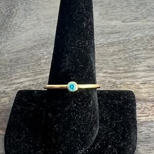 Ready-Made Gold tone ring band with blue jewel gem - size 10.25